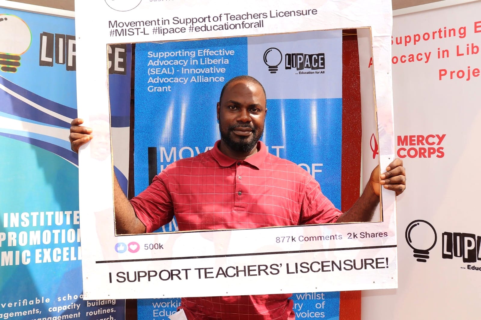 Participants display their training certificates